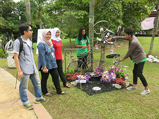 Students with their sculpture display at the Student Village.