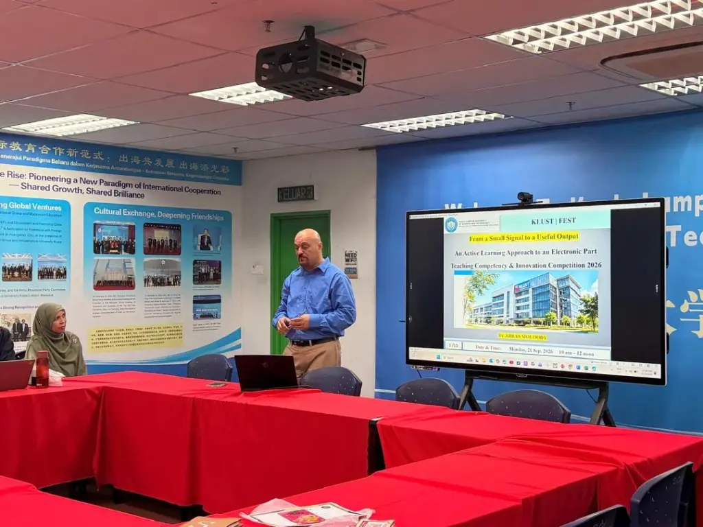 Dr Abbas of FEST presents to the judges and colleagues.